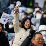Thousands of people protest in Seoul, South Korea, near President Yoon Suk Yeol's official residence calling for his arrest after his impeachment.