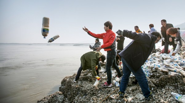 Activists in South Korea throw bottles full of rice, a Christian message, and USB drives into the ocean in hopes that North Korean residents would pick them up.
